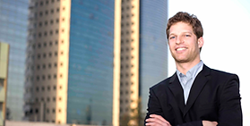 Professional in front of skyscrapers